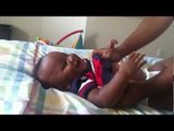 Adorable Baby Giggles Uncontrollably as Dad Tickles His Tummy