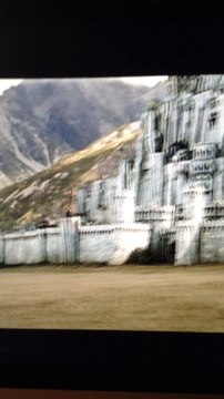 Gondor men returning to the gate