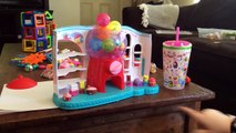 Opening capsules from the Shopkins Sweet Spot Food Fair Gumball Machine Playset by The Playinator