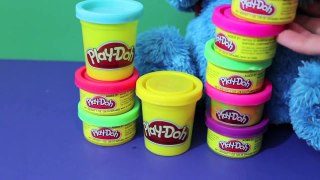Cookie Monster Builds PLAY DOH Tower & ELMO Knocks It Down
