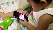 1 Year Old Asian Baby Flips Through iPhone and Plays Video