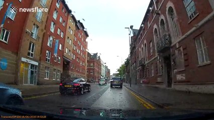 Driver goes onto pavement to avoid traffic