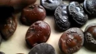 GROUP OF 28 HIGHLY UNUSUAL 1920s BAKELITE TYPE BUTTONS with GIRLS' HEAD MOTIFS