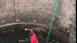 Die hard person jumping into the well to die