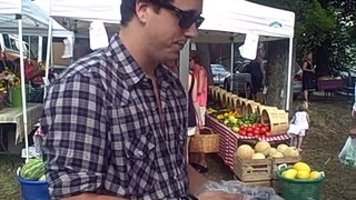 James Menafee Buys Berries at Byrd House Market July 28, 2009