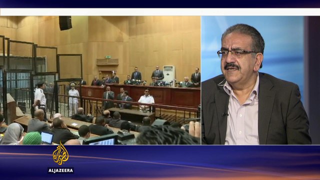 Trial of Mohamed Morsi and Al Jazeera journalists a 'sham', says Egyptian journalist