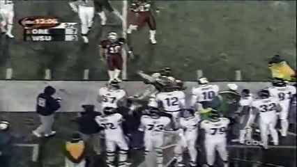 Oregon RB Onterrio Smith shakes four WSU defenders for a 1st down 10-27-01