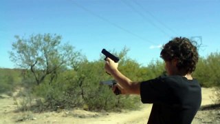 Dual weilding a Glock 22 and a Colt M1911A1