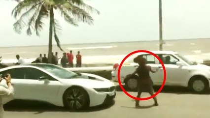 (VIDEO) Shahrukh Khan's RASH DRIVING Almost HITS Beggar With His BMW Car