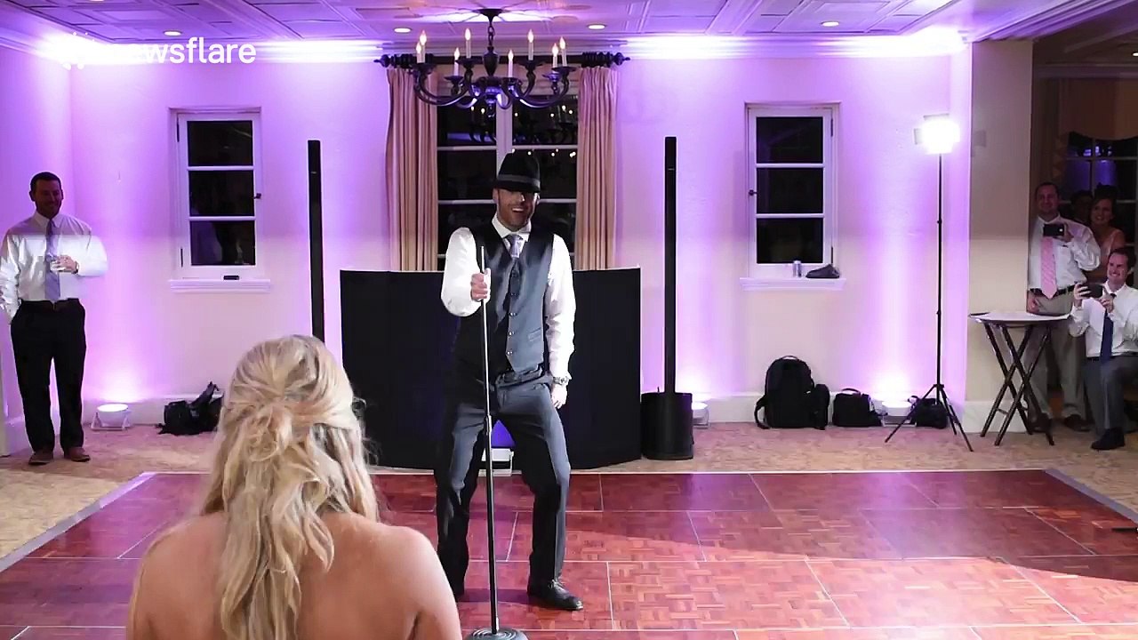 Groom surprises bride with Michael Jackson dance at wedding