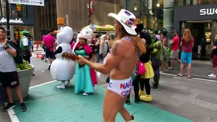 Times Square's Naked Cowboys reined in