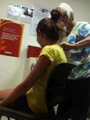 Noelle getting her 7th grade vaccinations with crazy funny nurse