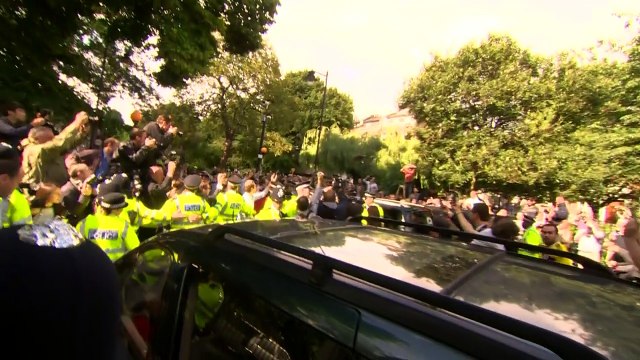 Boris leaves home to heckles and abuse