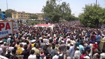 Pakistanis gathered to mourn slain Sufi singer
