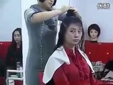 Chinese Women Headshave with razor in Barbershop
