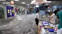 Floodwater swamps shopping mall