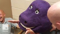 Teenager gets stuck in giant Barney mask