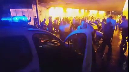 Hundreds of Irish fans chanting stand up for the French police