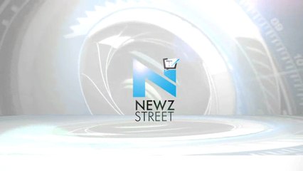 SI’s Joy Corrigan’s bikini top swims with the flow