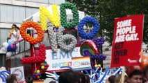 Police officers pop the question during London Pride parade
