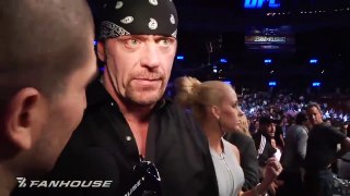 UNDERTAKER comes to watch Brock Lesnar's UFC match and they both come face to face while being interviewed by Ariel Helw