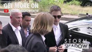Robert Pattinson and Hopper Penn arrives at the Dior Homme Menswear Spring Summer 2017 in Paris