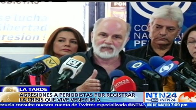 Periodistas venezolanos dicen en su día que seguirán informando pese a persecución y detenciones