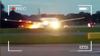 Singapore Plane Catches Fire at Changi Airport