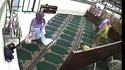 OMG! What is the Lady doing inside Mosque premises