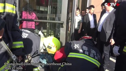 Boy Trapped In Revolving Door In China