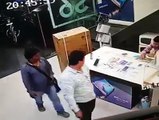 Two boys stealing mobile from a shop caught in CCTV footage