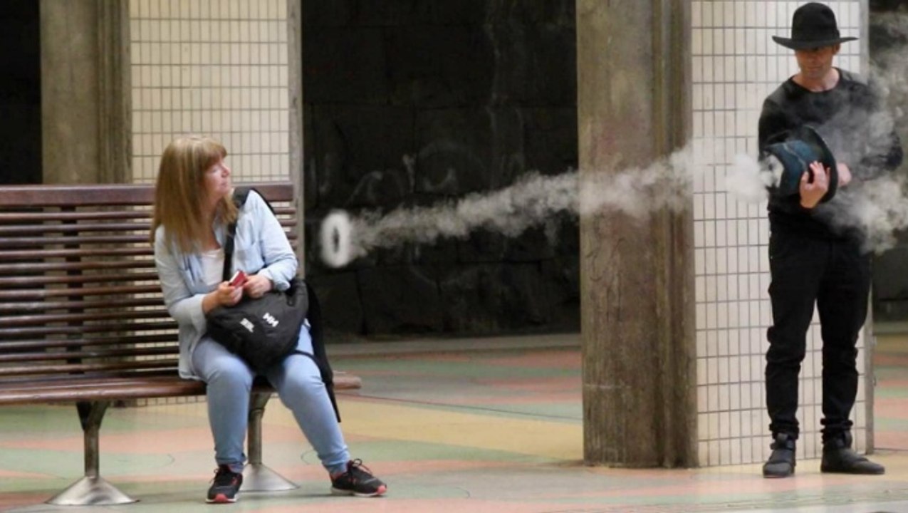 Magician Pranks People With Smoke Rings