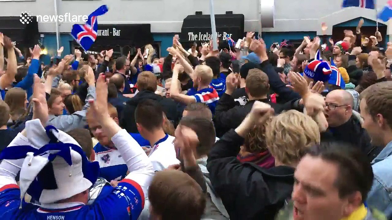 Iceland fans celebrate in downtown Reykjavik after beating England
