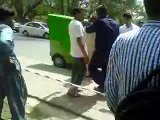 traffic warden beating a poor man