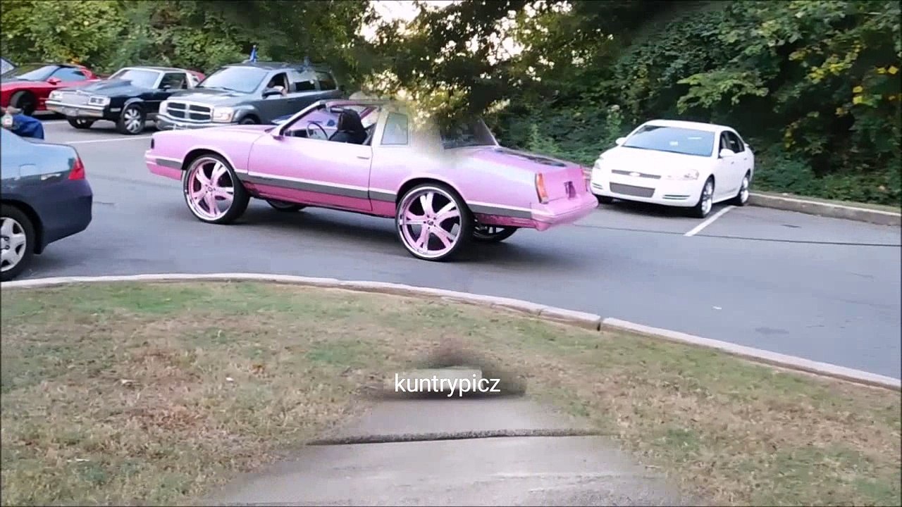 pink monte carlo on dub wheels