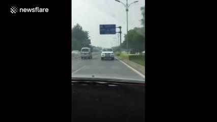 Car filmed driving backwards on motorway