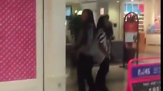 Two Women With Trash Bags Clear The Front Table At A Victoria Secret!
