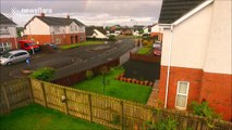 Drone footage of a vibrant rainbow at sunset