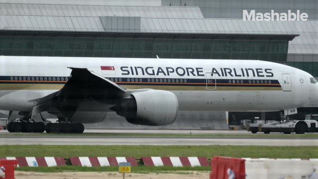 Singapore Airlines plane catches fire after emergency landing
