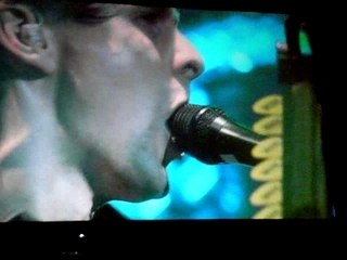 Muse sur scène à Bercy en decembre 2006