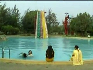 girls playful in swimming pool - amazing