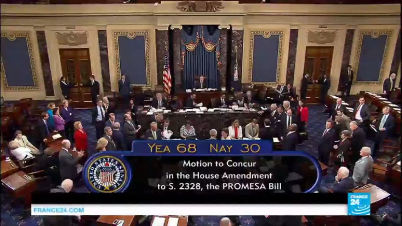 Puerto Rico debt crisis: President Obama signs restructuring plan into law