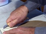 Using a chip carving knife to decorate a book cover