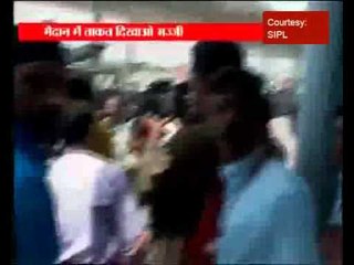 Angry Harbhajan hits a cameraman at Bangalore airport