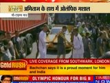 Amitabh Bachchan carries the Olympic torch in London ‎