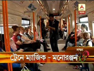 Magician showing magic in London train to entertain the public