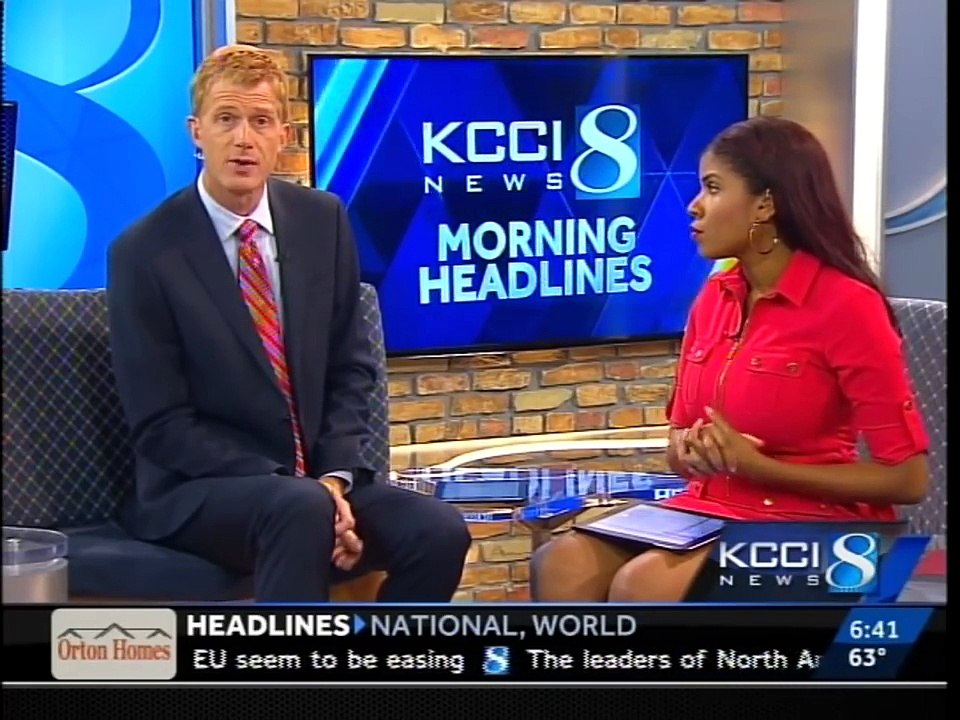 Iowa woman throws racial slur at reporter