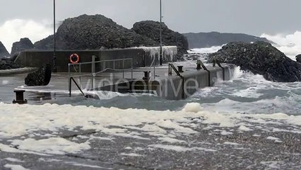 Ocean Storm Rages over Tiny Harbour - Stock Footage | VideoHive 9817602