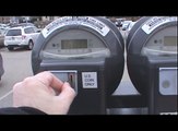 Putting Money In A Parking Meter, Royal Oak, Michigan April 9, 2016