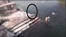 Ghost caught on Camera jumping in POND!